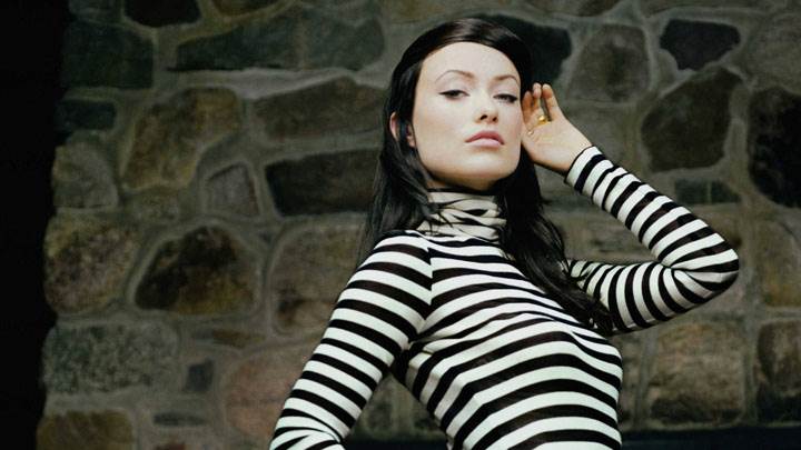 Olivia Wilde Modeling Pose In Black And White Dress
